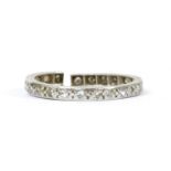 A platinum diamond eternity ring,