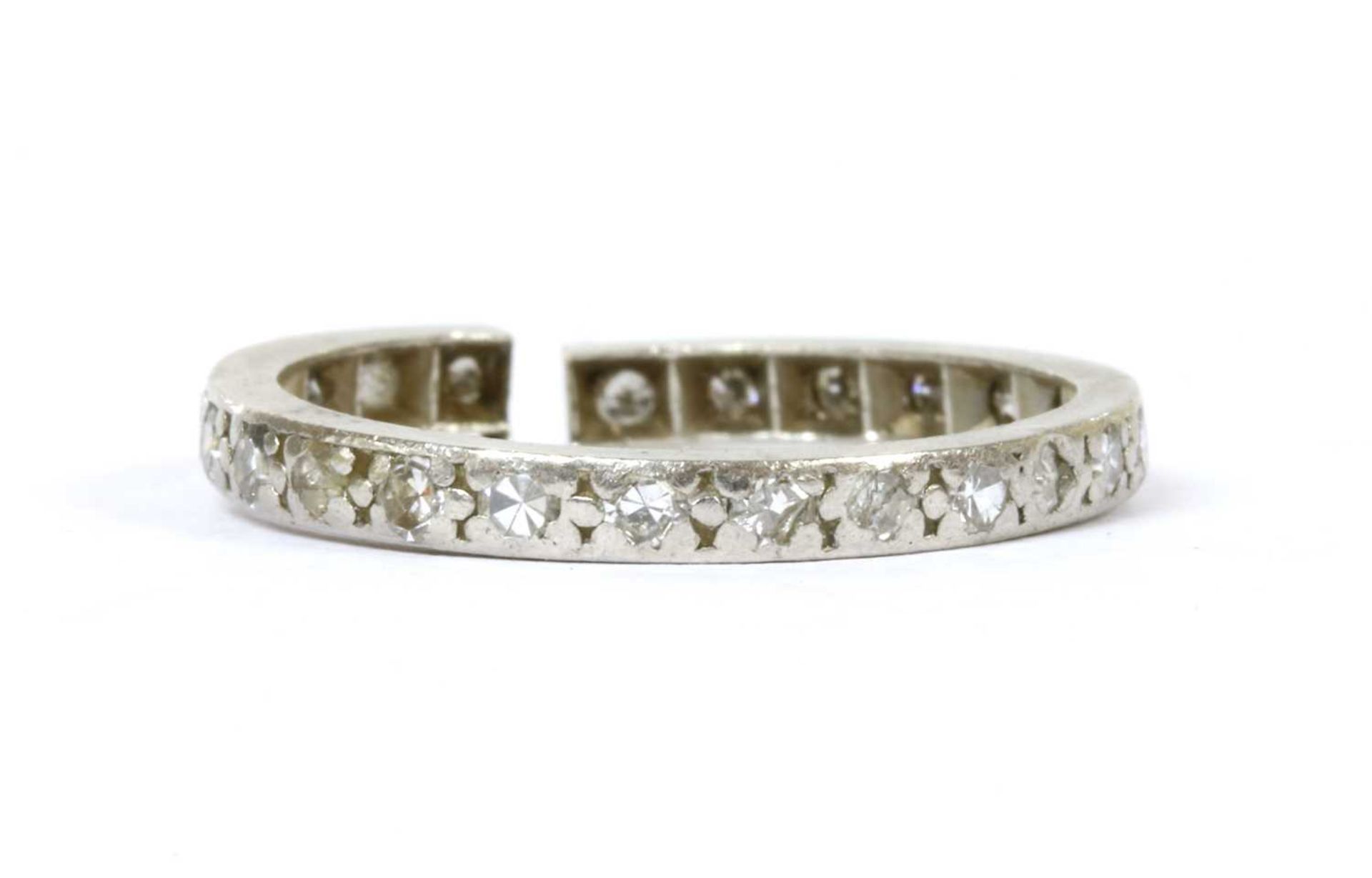 A platinum diamond eternity ring,