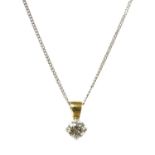 A gold single stone diamond pendant,