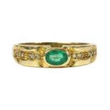 A 9ct gold emerald and diamond ring,