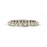 A white gold diamond full eternity ring,