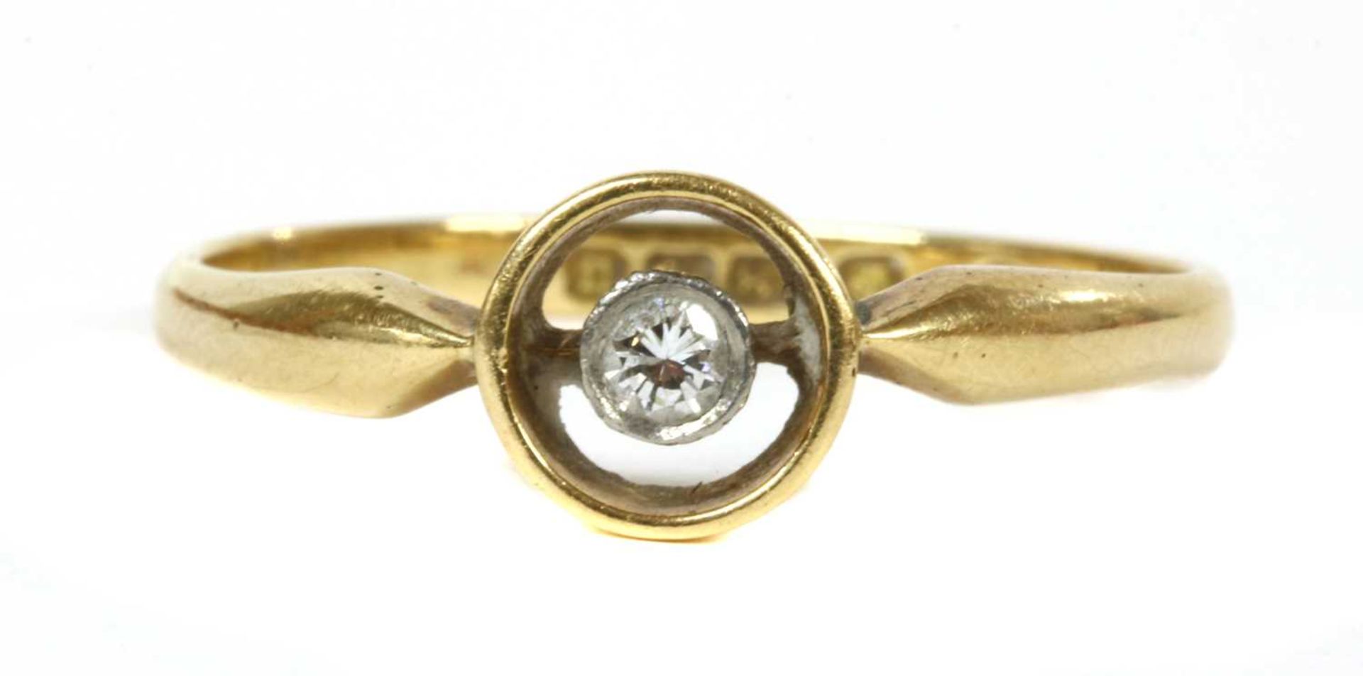 An 18ct gold single stone diamond ring, c.1920,