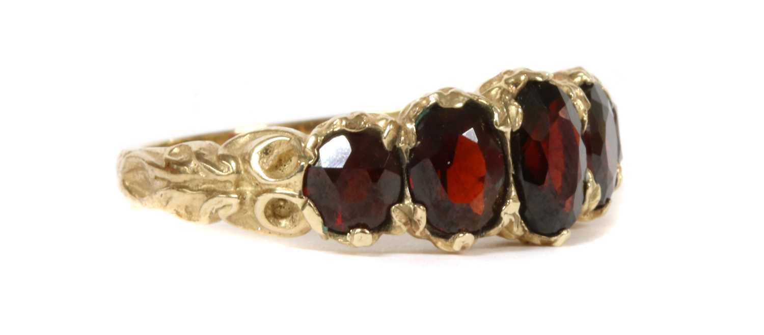 A 9ct gold five stone garnet ring, - Image 3 of 3