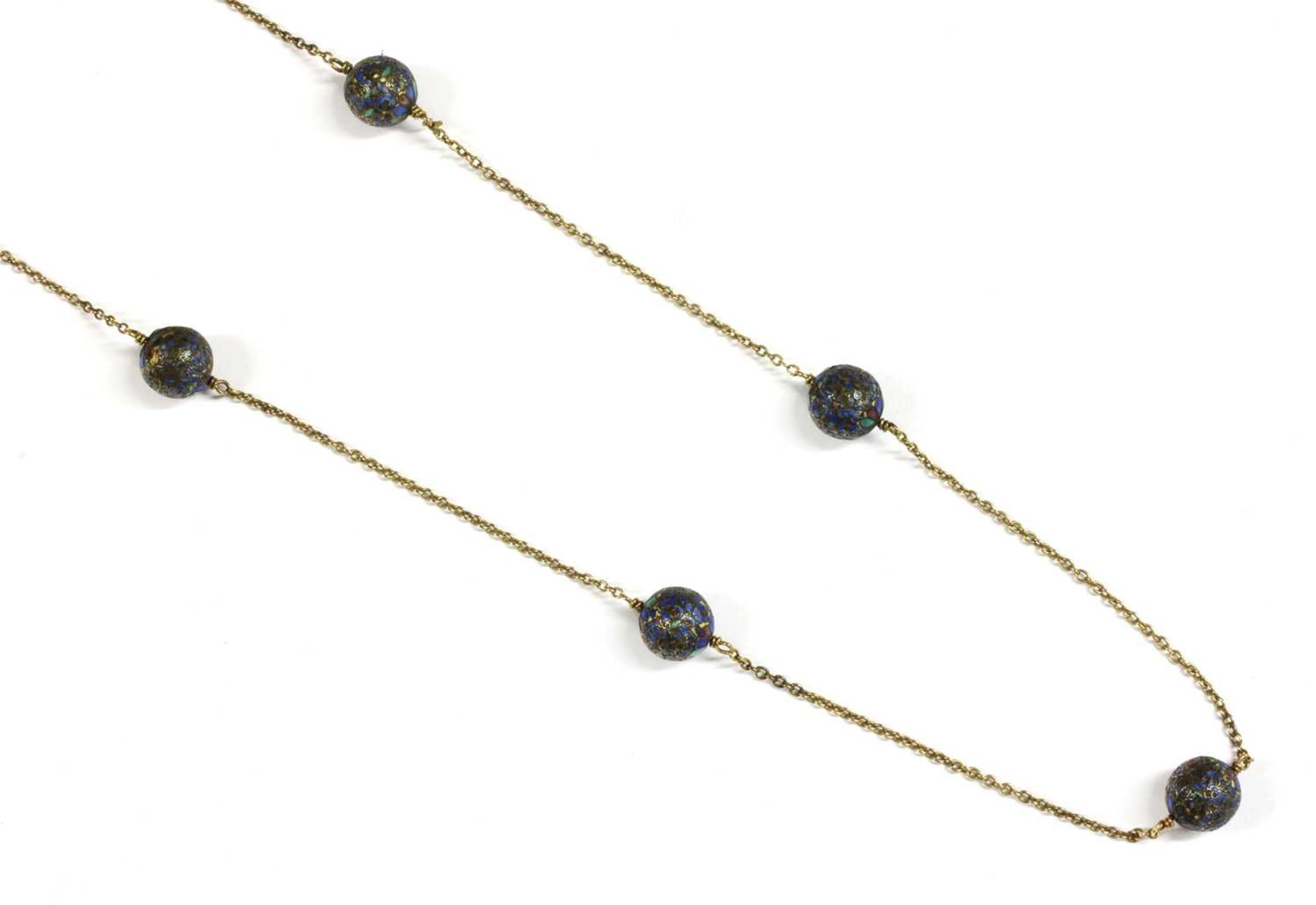 A gold enamel bead necklace,