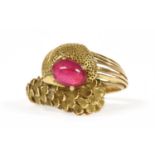 A gold synthetic ruby ring,