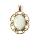 A 9ct gold opal and ruby pendant,