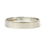 An 18ct white gold flat section wedding ring,