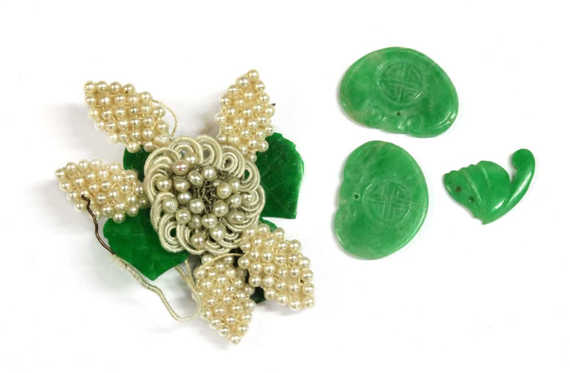 A seed pearl and jade flower,