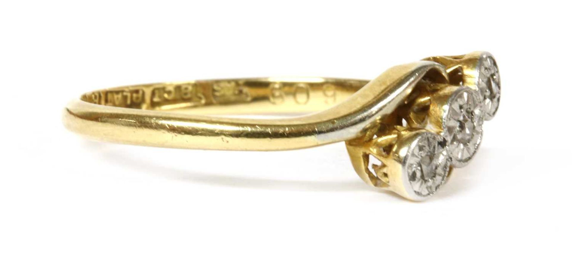A gold three stone diamond ring, c.1925, - Image 3 of 3