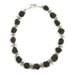 A contemporary silver lava stone and cultured freshwater pearl necklace,