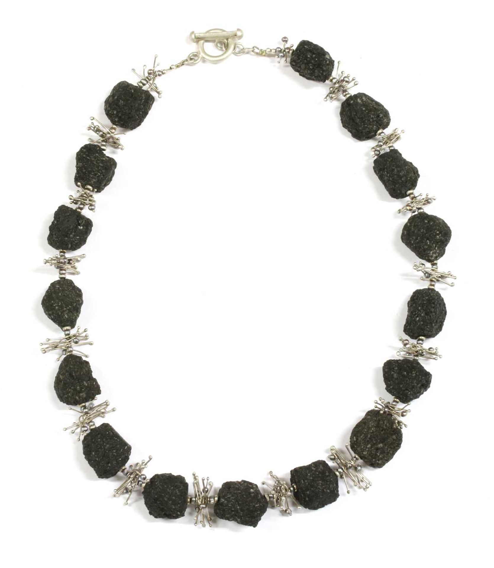 A contemporary silver lava stone and cultured freshwater pearl necklace,