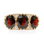 A 9ct gold garnet and diamond ring,