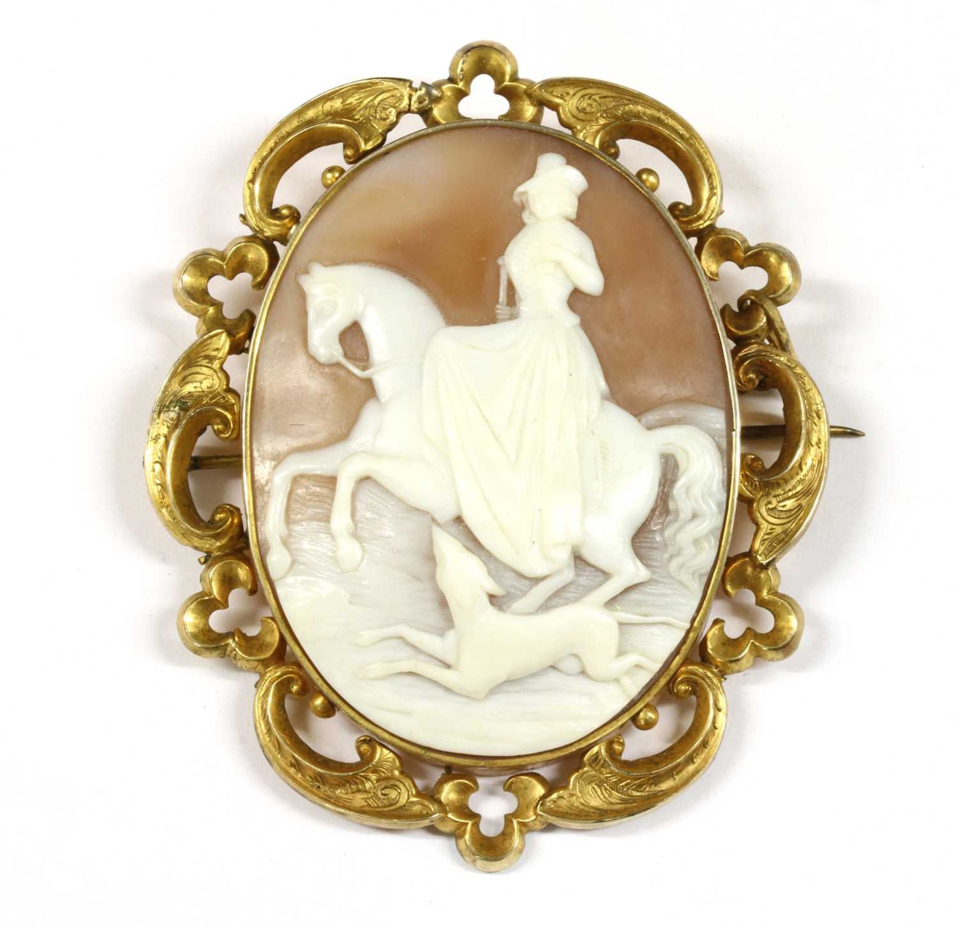 A rolled gold shell cameo brooch,