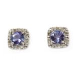 A pair of white gold tanzanite and diamond stud earrings,