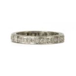 A white gold diamond full eternity ring,