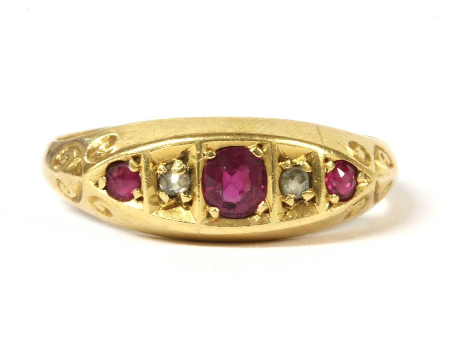 An 18ct gold five stone ruby and diamond ring,