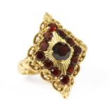 A gold garnet ring,