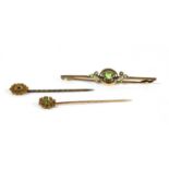 An Edwardian gold peridot and split pearl bar brooch,