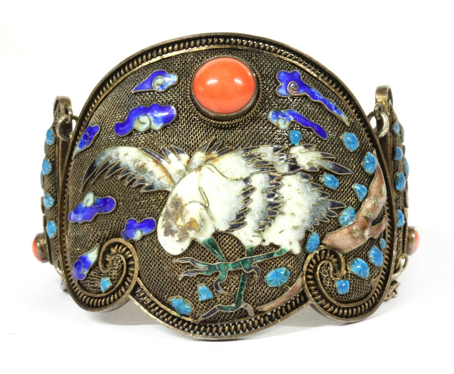 A Chinese silver gilt coral and enamel hinged bangle, c.1930,