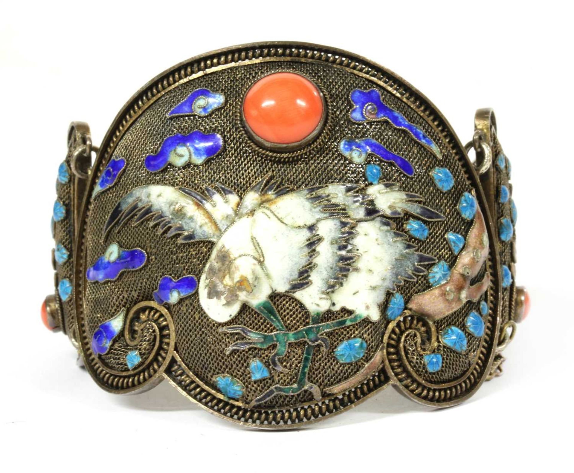 A Chinese silver gilt coral and enamel hinged bangle, c.1930,