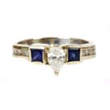 A white gold diamond and sapphire ring,