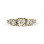 A 9ct white gold three stone diamond ring,