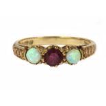 A 9ct gold ruby and opal three stone ring,