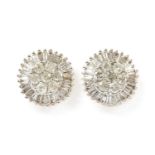 A pair of gold diamond cluster earrings,