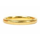 A 22ct gold light court section wedding ring,