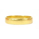 A 22ct gold flat section wedding ring,