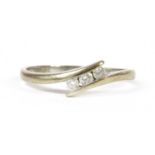 A 9ct white gold three stone diamond ring,