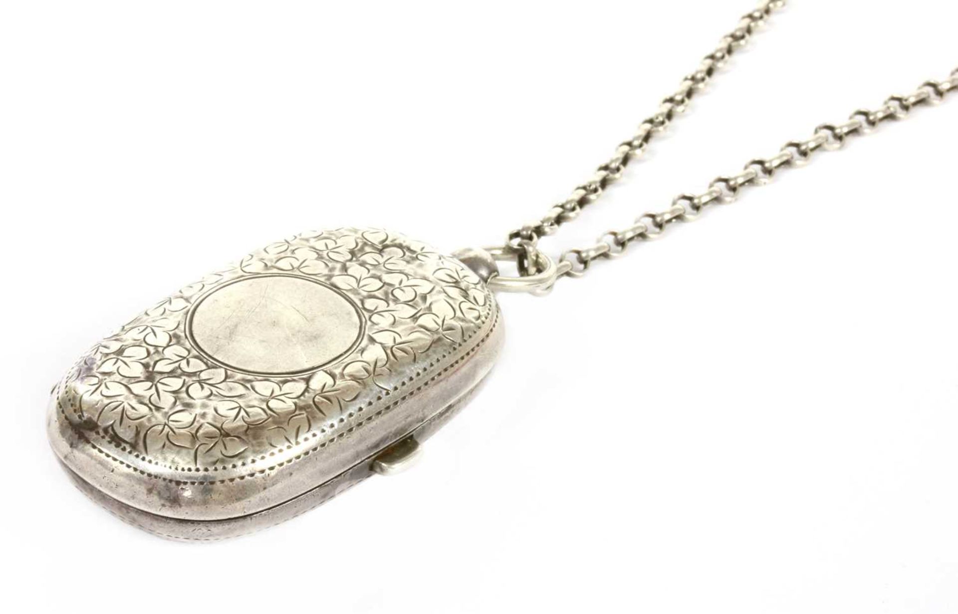 An Edwardian sterling silver twin section sovereign case,