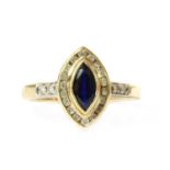 A gold sapphire and diamond cluster ring,