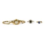 A gold sapphire and cubic zirconia cluster ring,