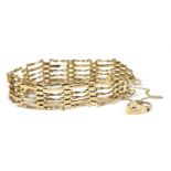 A 9ct gold six row gate bracelet,