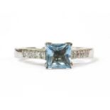 An 18ct white gold aquamarine and diamond ring,