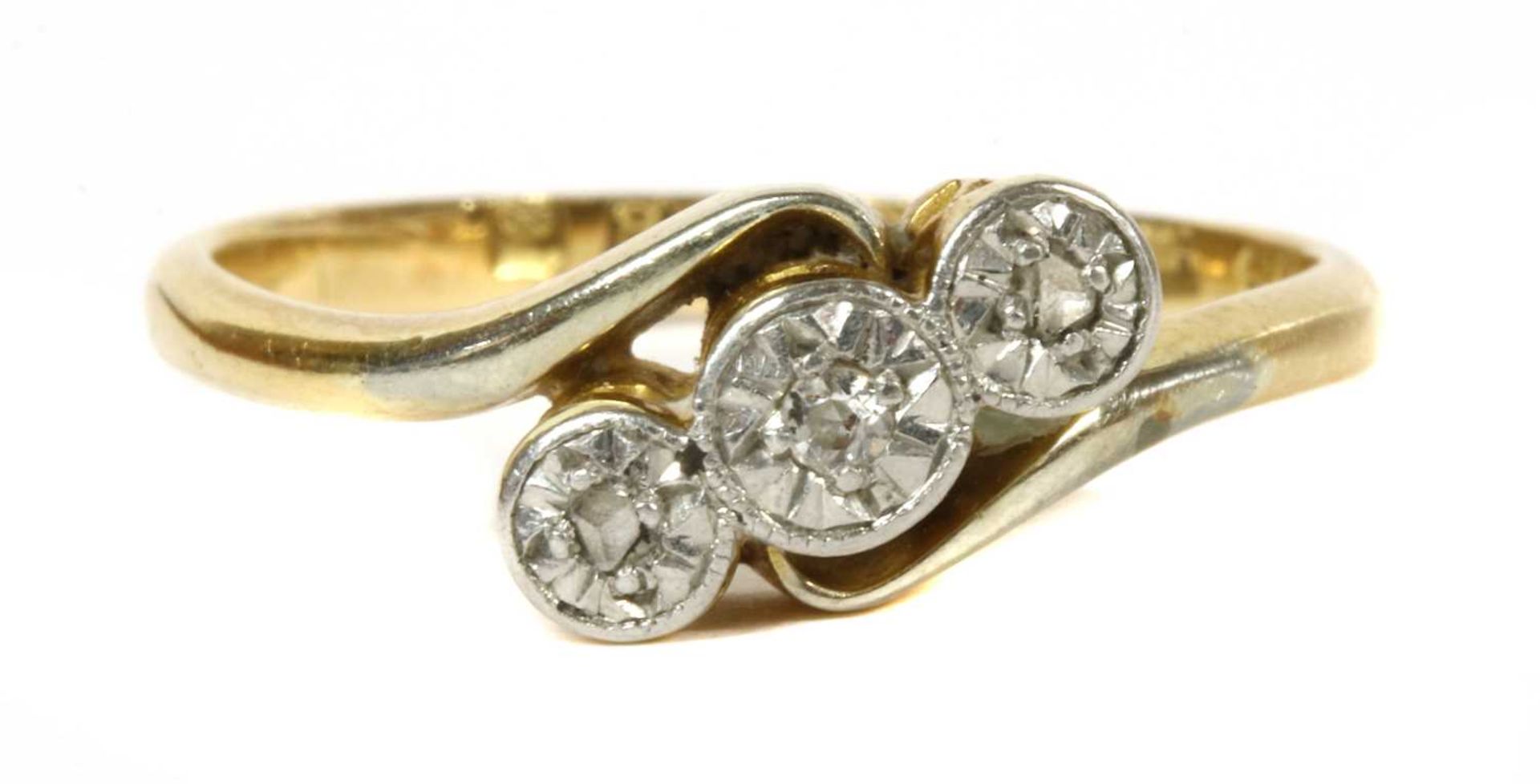 A gold three stone diamond ring, c.1925,