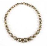 An Italian sterling silver single row graduated bead necklace, by Old Florence,