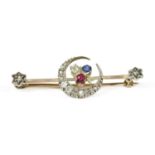 A gold and silver, diamond, ruby and sapphire crescent bar brooch,
