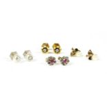 Four pairs of gold earrings,