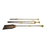 A collection of Victorian brass and steel fireplace tongs,