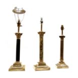 Three silvered table lamps,