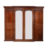 A Victorian mahogany breakfront triple wardrobe,