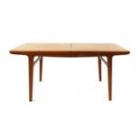 A Danish teak extending dining table