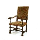 A Continental carved walnut throne chair,