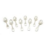 A set of eight Newcastle silver dessert spoons,