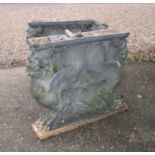 A pair of composition stone table supports