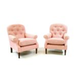 A pair of modern Laura Ashley 'Cambridge' pattern button backed easy chairs,