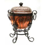 An Arts and Crafts copper and wrought iron coal bucket,