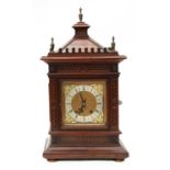 A Victorian walnut mantel clock,